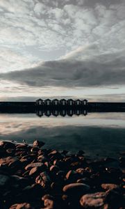 Preview wallpaper coast, stones, sea, houses, reflection
