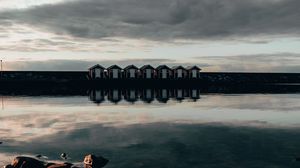 Preview wallpaper coast, stones, sea, houses, reflection