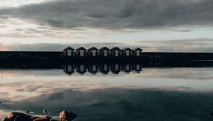 Preview wallpaper coast, stones, sea, houses, reflection