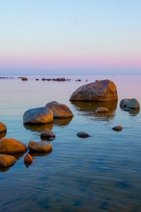 Preview wallpaper coast, stones, sea, horizon, twilight