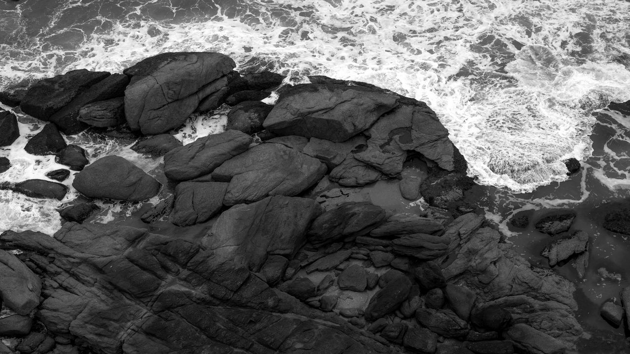 Wallpaper coast, stones, sea, waves, black and white, aerial view