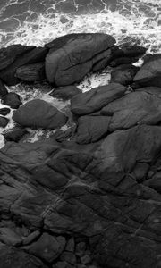 Preview wallpaper coast, stones, sea, waves, black and white, aerial view