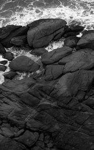 Preview wallpaper coast, stones, sea, waves, black and white, aerial view