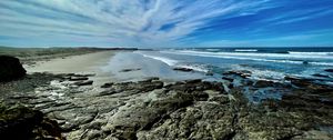 Preview wallpaper coast, stones, sea, waves, clouds, nature