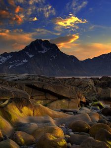Preview wallpaper coast, stones, smooth, wet, sea, mountains, evening, sky