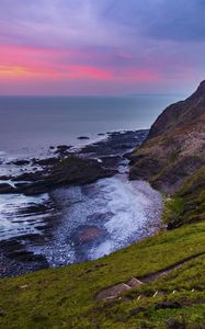 Preview wallpaper coast, sunset, rocks, surf