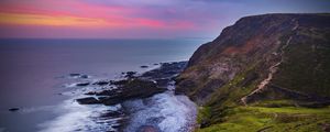 Preview wallpaper coast, sunset, rocks, surf