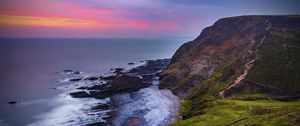 Preview wallpaper coast, sunset, rocks, surf