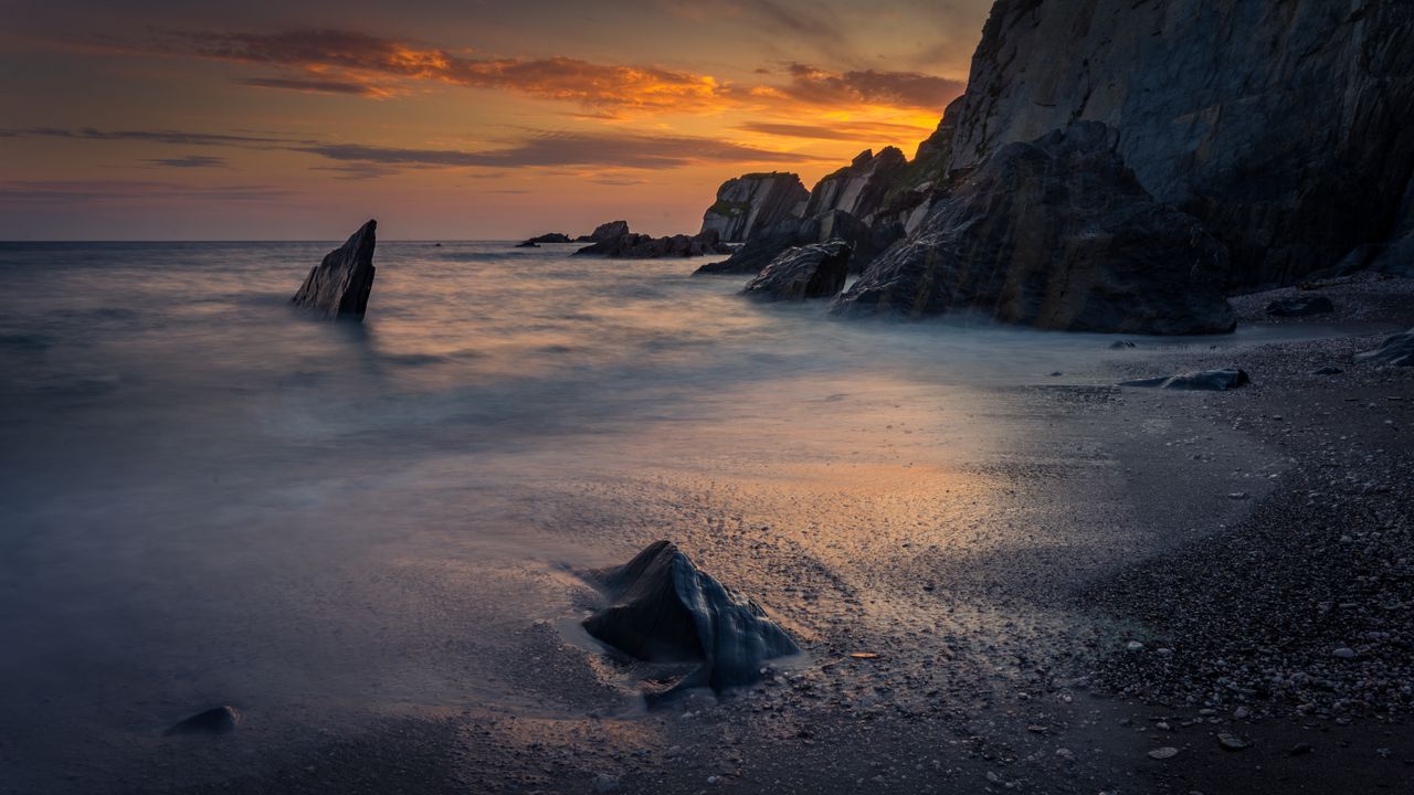 Wallpaper coast, sunset, rocks, sea, sand
