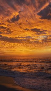Preview wallpaper coast, sunset, waves, sea, clouds