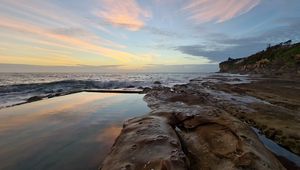 Preview wallpaper coast, water, sea, sunset, twilight