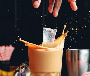 Preview wallpaper coffee, coffee beans, ice, hand, spray, glass