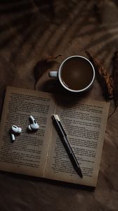 Preview wallpaper coffee, cup, book, headphones, text