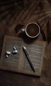 Preview wallpaper coffee, cup, book, headphones, text