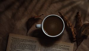 Preview wallpaper coffee, cup, book, headphones, text