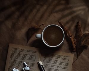 Preview wallpaper coffee, cup, book, headphones, text