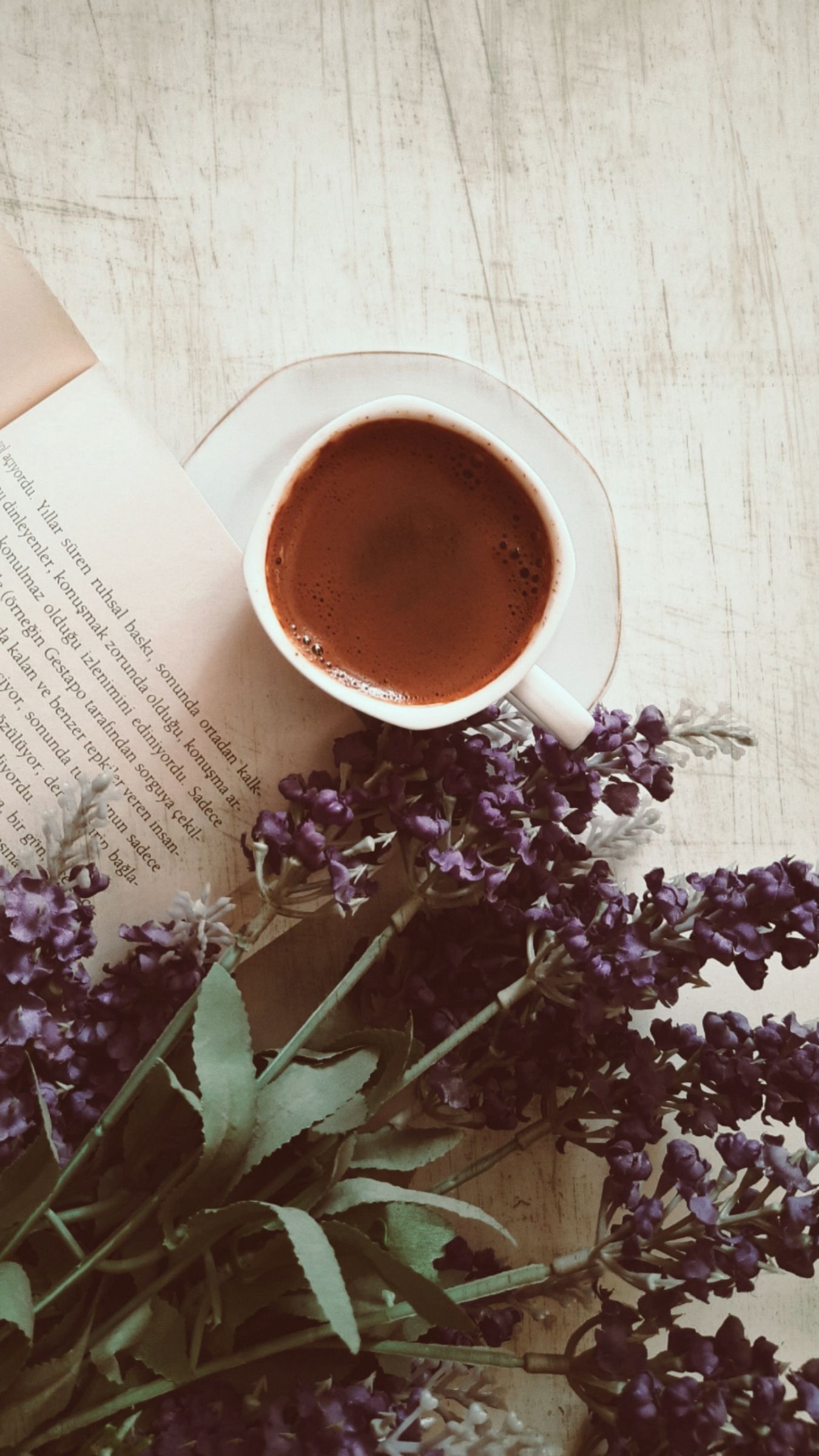 Download wallpaper 1350x2400 coffee, cup, book, flowers, text iphone  8+/7+/6s+/6+ for parallax hd background