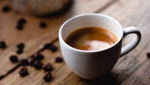 Preview wallpaper coffee, cup, coffee beans, surface, wooden