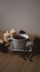 Preview wallpaper coffee, cup, coffee beans, pine cones, candles