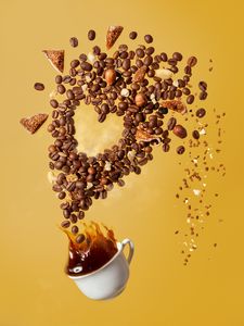 Preview wallpaper coffee, cup, coffee beans, nuts, splashes