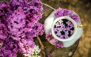 Preview wallpaper coffee, cup, lilac, flowers, wooden