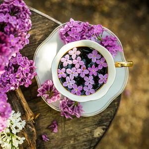 Preview wallpaper coffee, cup, lilac, flowers, wooden