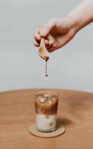 Preview wallpaper coffee, drink, ice, hand, spoon, drops