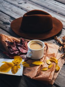 Preview wallpaper coffee, hat, leaves
