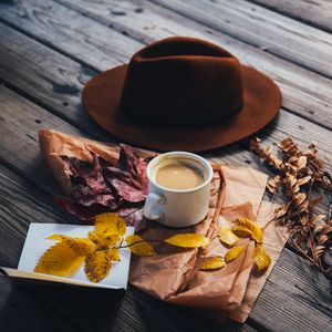 Preview wallpaper coffee, hat, leaves