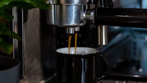 Preview wallpaper coffee machine, mug, coffee, leaves, plant