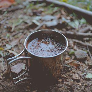 Preview wallpaper coffee, mug, foam, foliage