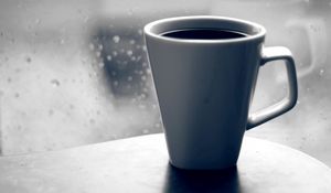 Preview wallpaper coffee, mug, glass, window, drops, rain, grief, black-and-white