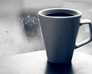 Preview wallpaper coffee, mug, glass, window, drops, rain, grief, black-and-white