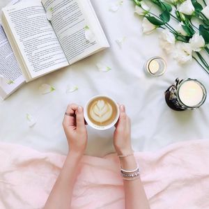 Preview wallpaper coffee, petals, book, candle, aesthetics