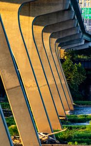 Preview wallpaper columns, bridge, river, grass, city