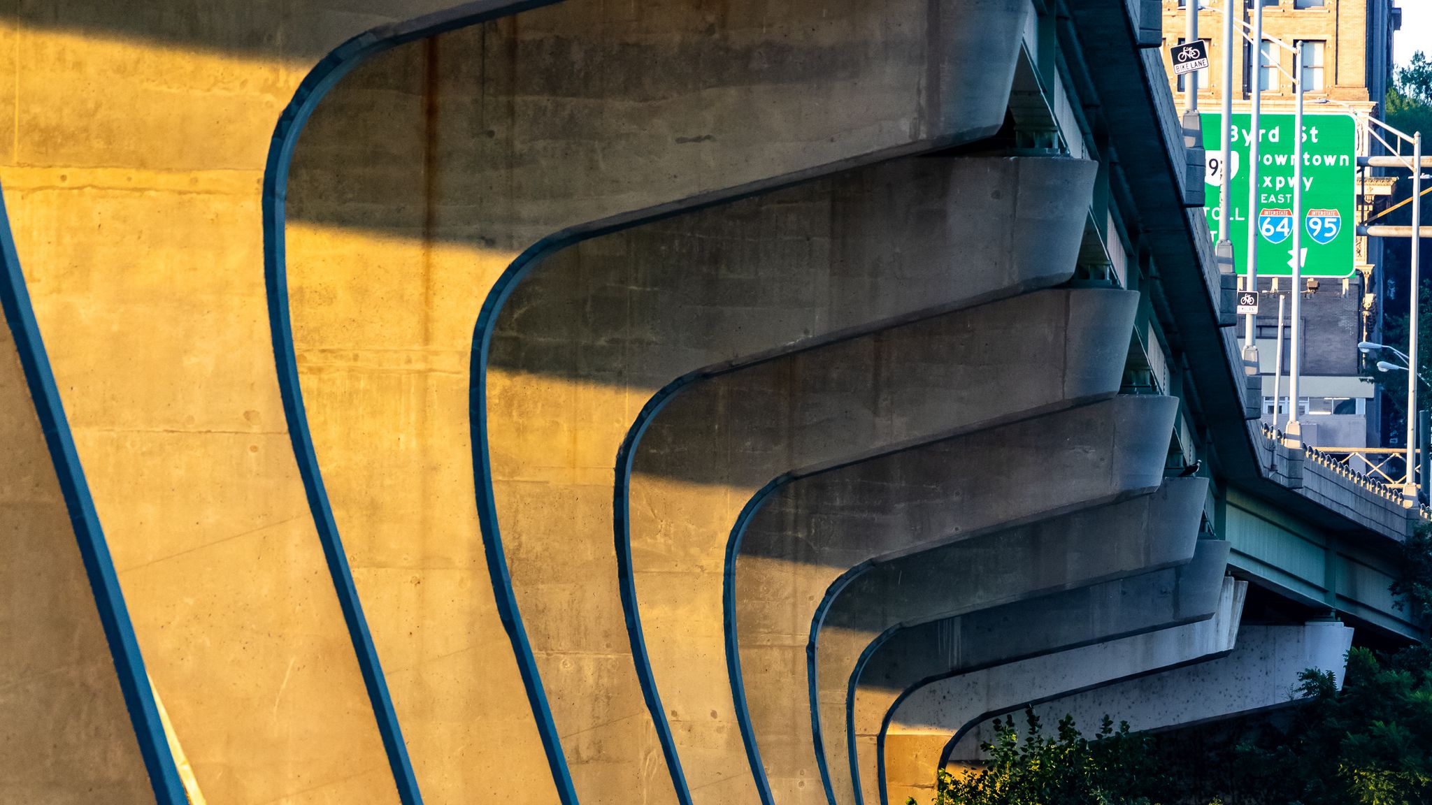 2048x1152 Wallpaper columns, bridge, river, grass, city