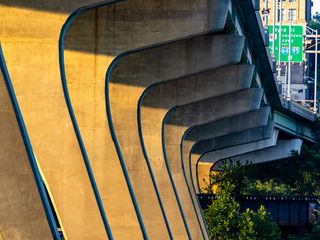 320x240 Wallpaper columns, bridge, river, grass, city