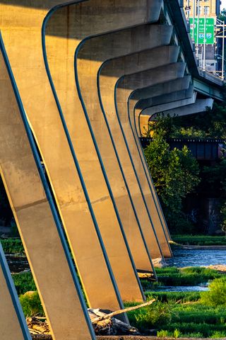 320x480 Wallpaper columns, bridge, river, grass, city