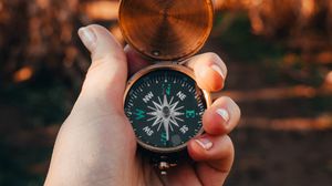 Preview wallpaper compass, hand, device, metal