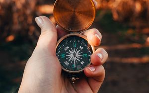 Preview wallpaper compass, hand, device, metal