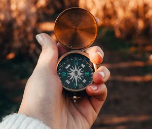 Preview wallpaper compass, hand, device, metal