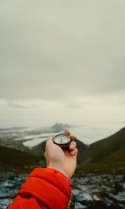 Preview wallpaper compass, hand, mountains, nature