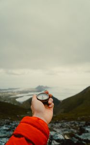 Preview wallpaper compass, hand, mountains, nature