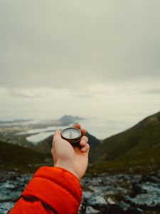 Preview wallpaper compass, hand, mountains, nature