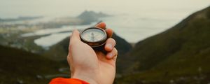 Preview wallpaper compass, hand, mountains, nature