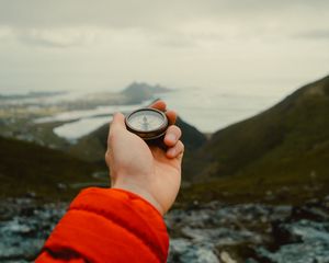 Preview wallpaper compass, hand, mountains, nature