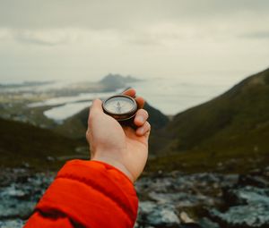 Preview wallpaper compass, hand, mountains, nature