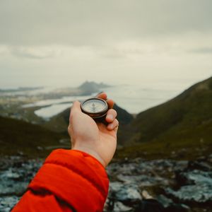 Preview wallpaper compass, hand, mountains, nature