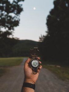 Preview wallpaper compass, hand, nature, travel