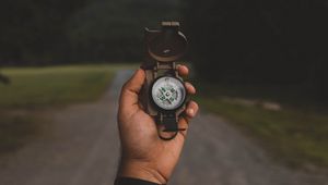 Preview wallpaper compass, hand, nature, travel